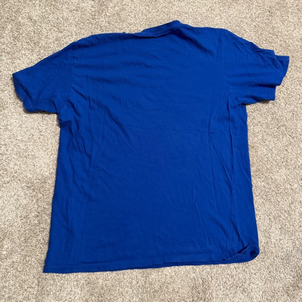 The North Face Mens Royal Blue Graphic Logo T-Shirt Size Large Circular Design